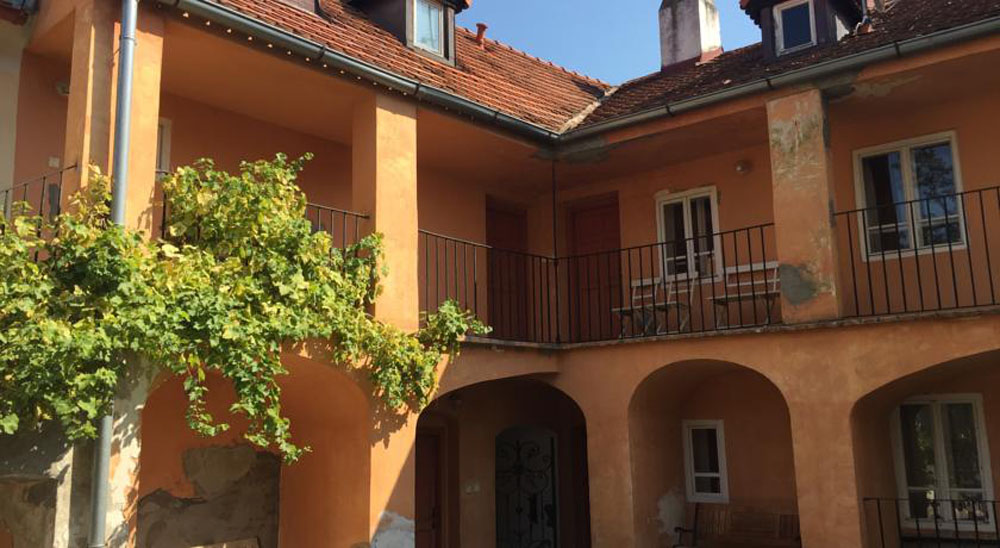 At the Golden Plough Apartments